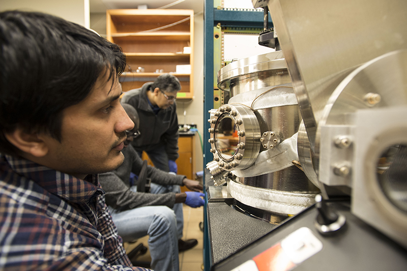 SIU Physics students working on a project
