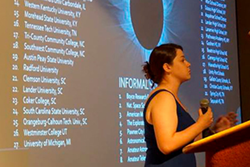 Sarah speaks at a seminar